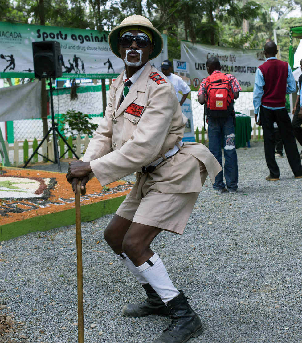 A marketer dressed as a member of Boy Scout solicits business at a booth of Nairobi International Trade Fair in Nairobi, capital of Kenya, Oct. 5, 2012. The Nairobi International Trade Fair was held from Oct. 1 to 7 in Nairobi. This year's fair focused on the theme of the enhancing technology in agriculture and industry for food security and national growth. (Xinhua/Zhang Weiyi) 