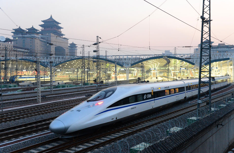 The world's longest high-speed railway linking Beijing and Guangzhou starts operation on Dec. 26, 2012. China opened the world's longest high-speed railway which links Beijing and the southern economic center of Guangzhou on Dec. 26. Running at an average speed of 300 kilometers per hour, the 2,298-kilometer-long Beijing-Guangzhou high-speed railway will cut travel time between the two cities to about 8 hours. (Xinhua/Wang Song) 