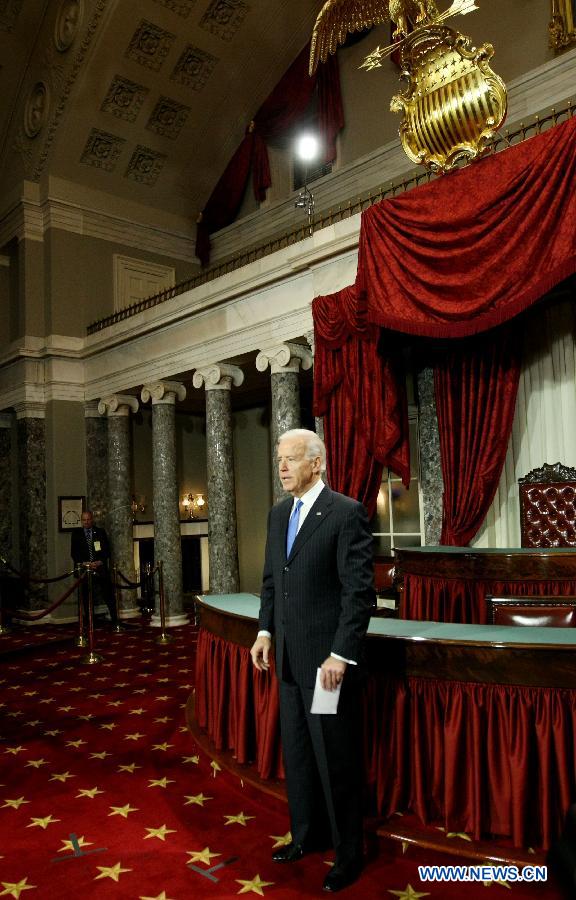 U.S. Vice President Joe Biden waits for Senators' Swearing-In ceremony in the Old Senate Chamber on Capitol Hill on Thursday, January 3, 2013. The new U.S. Congress convened on Thursday with new members being sworn in. (Xinhua/Fang Zhe) 