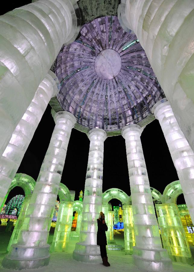 Photo taken on Jan. 5, 2013 shows a palace-shaped ice sculpture in the Ice and Snow World during the 29th Harbin International Ice and Snow Festival in Harbin, capital of northeast China's Heilongjiang Province. The festival kicked off on Saturday. (Xinhua/Wang Jianwei)