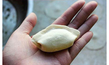 Jiaozi is made in shell shape (Source: www.nen.com.cn)