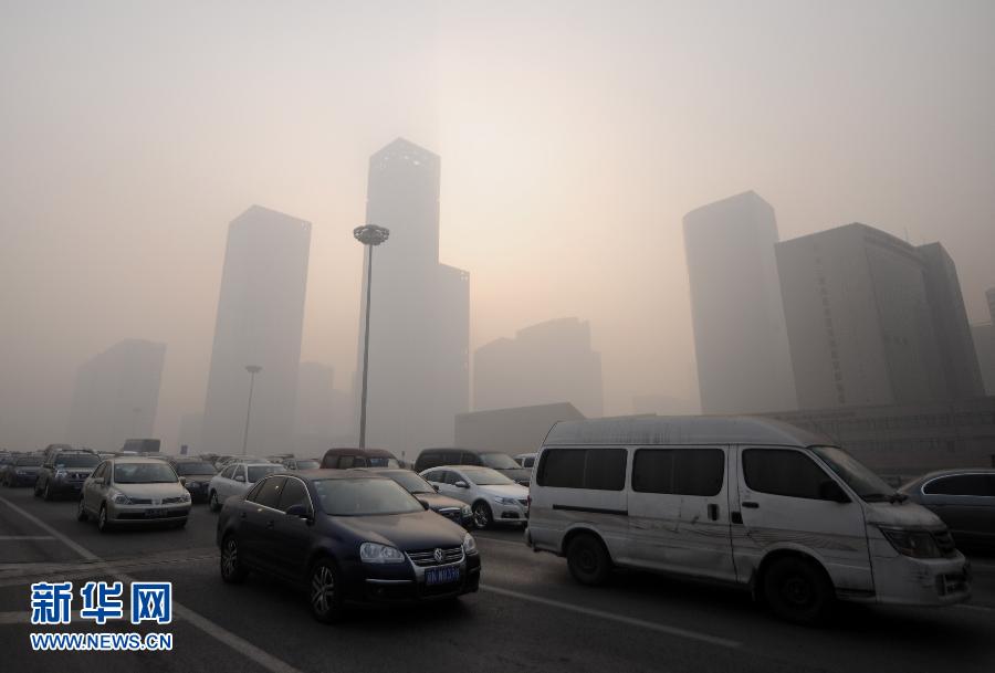 Buildings are shrouded in a dense smog near the CBD (Central Business District) area in Beijing, capital of China, Jan. 12, 2013. Beijing was shrouded in dense smog for the second straight day Saturday. The smoggy weather will not clear up until Monday, the city's environment monitoring center said. Beijing's air is heavily polluted. Readings for PM2.5, or airborne particles with a diameter of 2.5 microns or less, small enough to deeply penetrate the lungs, were as high as 456 on Saturday. (Xinhua/Luo Xiaoguang)