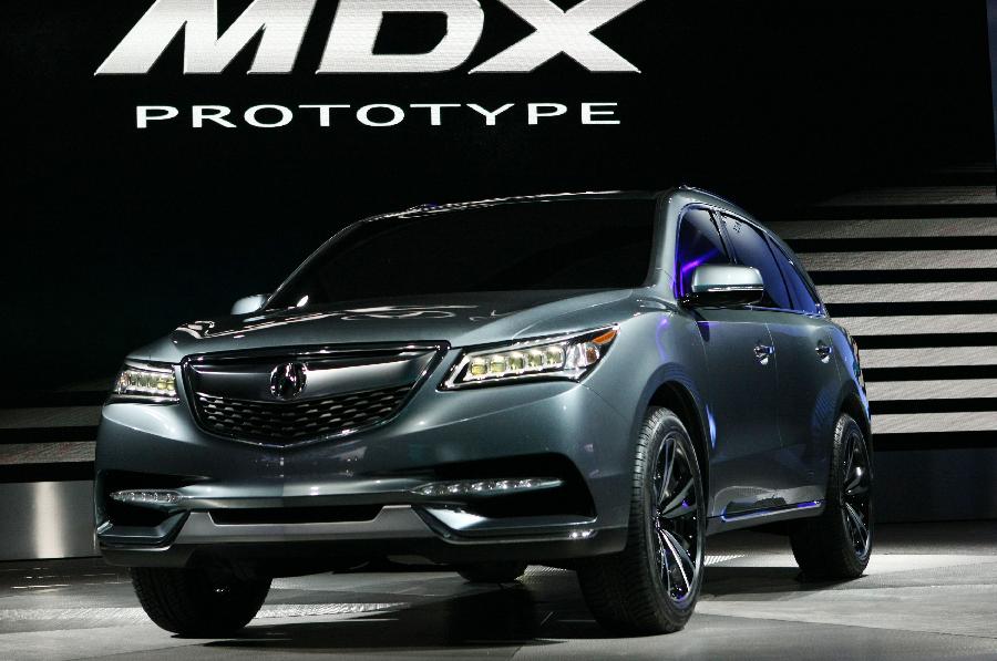 The Acura 2014 MDX Prototype is presented at the 2013 North American International Auto Show (NAIAS) media preview at the Cobo Center in Detroit, the United States, Jan. 15, 2013. (Xinhua/Fang Zhe) 