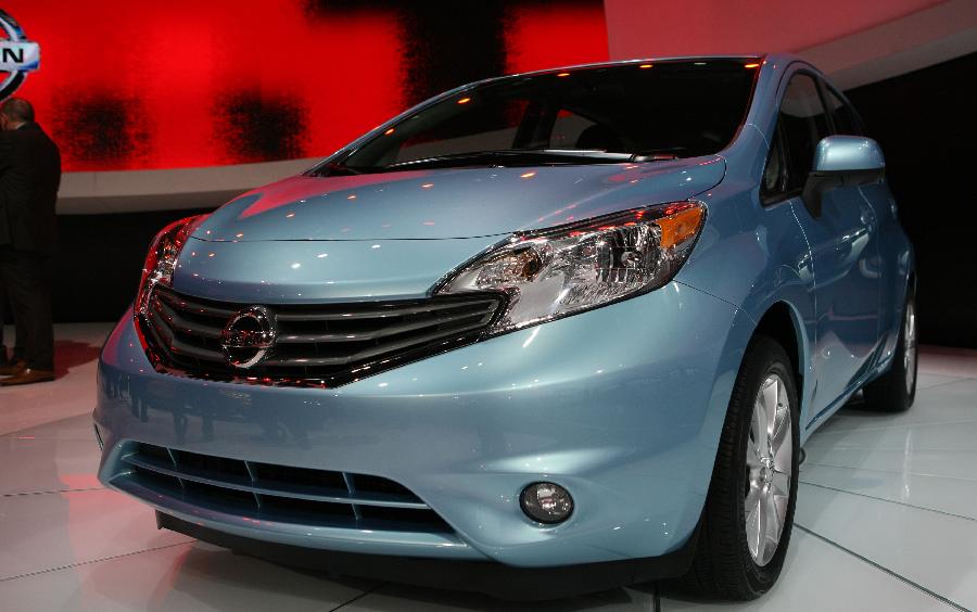 The Nissan VERSA is presented at the 2013 North American International Auto Show (NAIAS) media preview at the Cobo Center in Detroit, the United States, Jan. 15, 2013. (Xinhua/Fang Zhe) 
