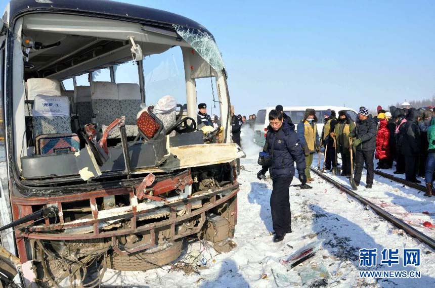 Ten people died after a cargo train and a passenger bus collided on Monday morning in northeast China's Heilongjiang Province, local government sources said. The collision happened at 7:36 a.m. in the city of Heihe. (Photo/Xinhua) 