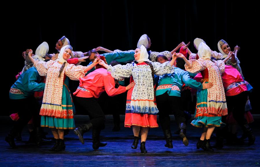 Artists of the National Little Birch Tree Dance Troupe of Russia perform at the Oriental Theatre in Changchun, capital of northeast China's Jilin Province, Jan. 28, 2013. The performance was staged to greet the upcoming Spring Festival which falls on Feb. 10 this year. (Xinhua/Xu Chang)