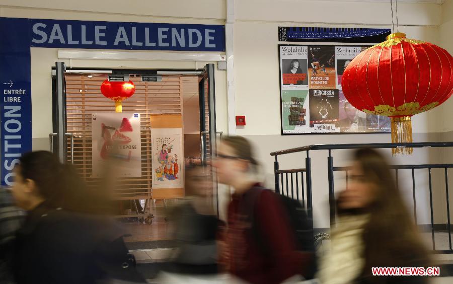 A building is decorated with traditional Chinese characteristics at Universite Libre de Bruxelles in Brussels, capital of Belgium, Feb. 8, 2013. The university hailed the Chinese Lunar New Year due on Feb. 10 with activities and decorations full of traditional Chinese characteristics. (Xinhua/Wang Xiaojun)