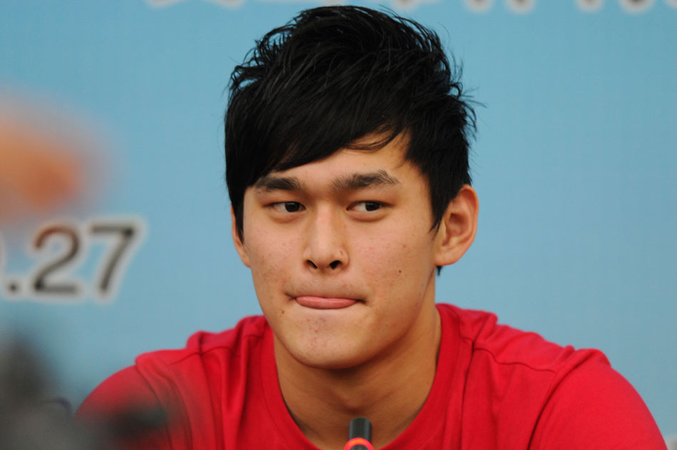 A photo shows Sun Yang, the first male swimmer to win an Olympic gold for China, answering questions in a news conference in Anhui province. Zhejiang College of Sports on Feb. 4 announced to temporarily suspend all his commercial activities for disciplinary violations. (Xinhua/Du Yu)