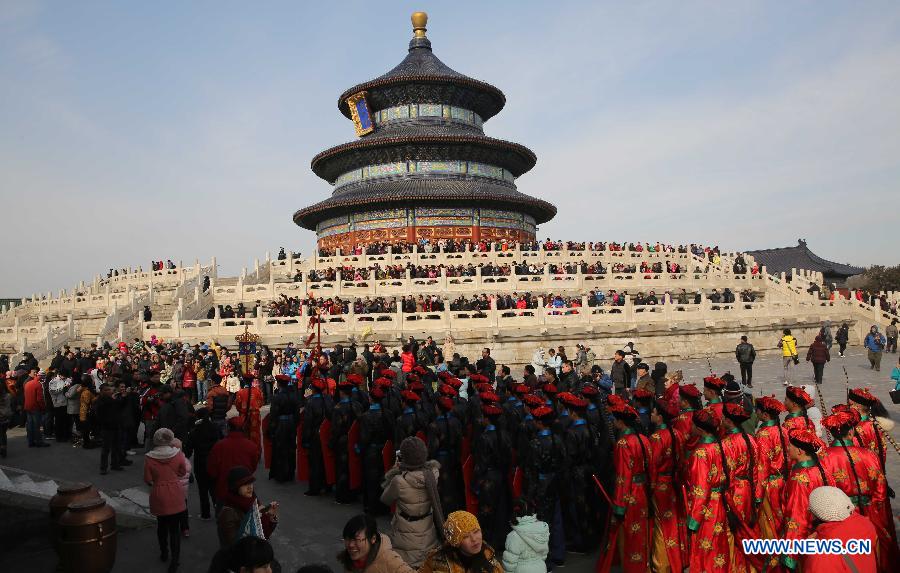 Performers wearing costumes of the Qing Dynasty (1644-1911) act during a performance presenting the ancient royal heaven worship ceremony in the Temple of Heaven in Beijing, capital of China, Feb. 10, 2013. The Temple of Heaven, first built in 1420 and used to be the imperial sacrificial altar during the Ming (1368-1644) and Qing dynasties, held reenaction of the ancient royal ritual for the worship of the heaven on Sunday, the first day of Chinese Lunar Year of the Snake. The performance will also be given in the next four days. (Xinhua/Liang Zhiqiang)  