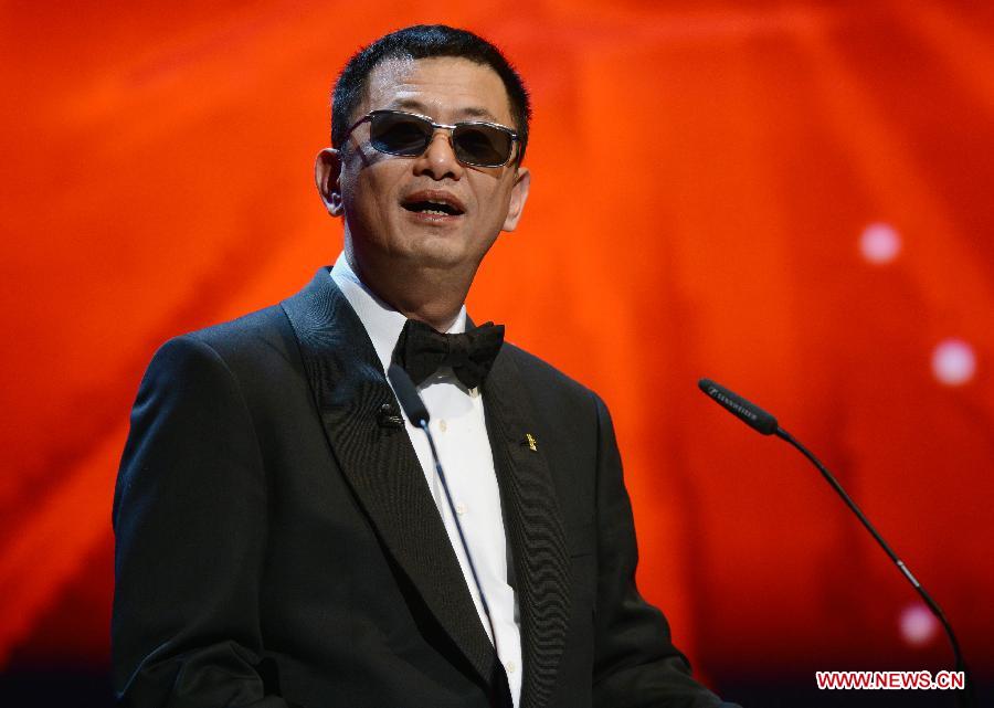 Jury President and Chinese Director Wong Kar Wai addresses the awards ceremony at the 63rd Berlinale International Film Festival in Berlin, Feb. 16, 2013. (Xinhua/Ma Ning)