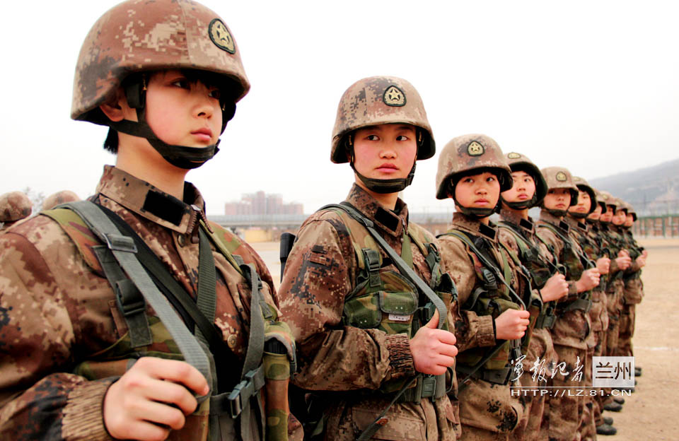 The female soldiers of a division of the Lanzhou Military Area Command (MAC) of the Chinese People's Liberation Army (PLA) carry out hard training on a military training ground.  (China Military Online/Yu Jinyuan, Yao Xudong, Ma Sancheng)