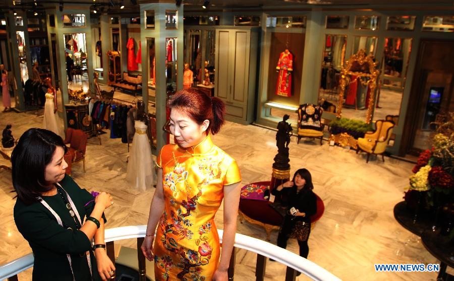 Photo taken on March 2, 2013 shows the interior scene of the "Chinese Bride" flagship store in No. 22 Waitan in Shanghai, east China. A wedding dress show was held by Guo Pei, the owner of the flagship store "Chinese Bride" and also a prominent designer who has created ceremonial dresses for both the CCTV Spring Festival Gala and the 2008 Beijing Olympics. (Xinhua/Zhang Ming)