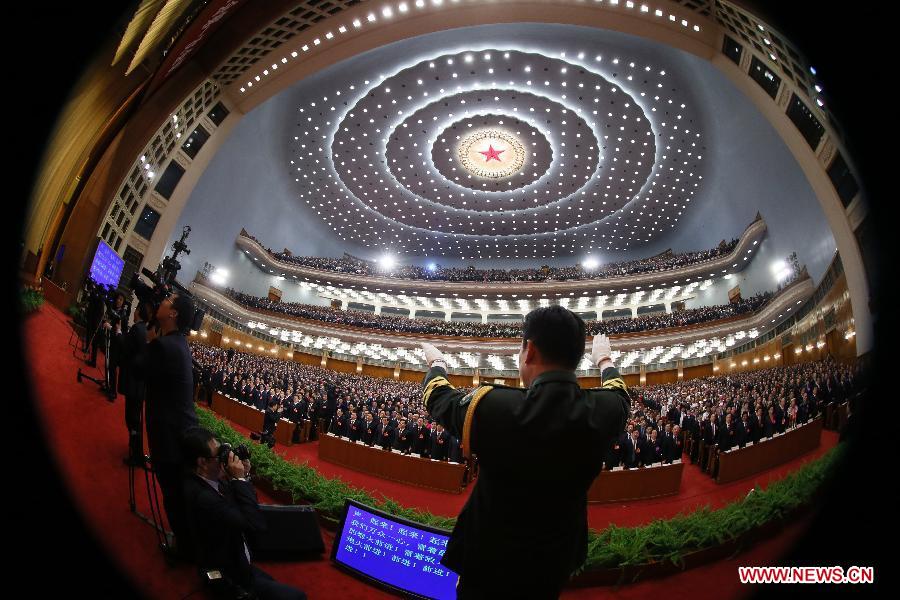 Deputies sing the national anthem during the opening meeting of the first session of the 12th National People's Congress (NPC) at the Great Hall of the People in Beijing, capital of China, March 5, 2013. (Xinhua/Lan Hongguang) 