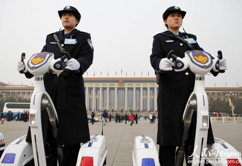 Two police officers are patrolling at Tiananmen Square on Mar 04, 2013. (Photo/ People's Daily Online)