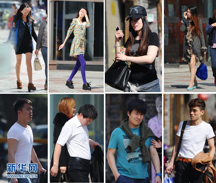 Pedestrians wear spring and even summer clothes on the street of Yangzhou on Mar. 6, 2013. The temperature reached 22 degrees Celsius (Photo/Xinhua)