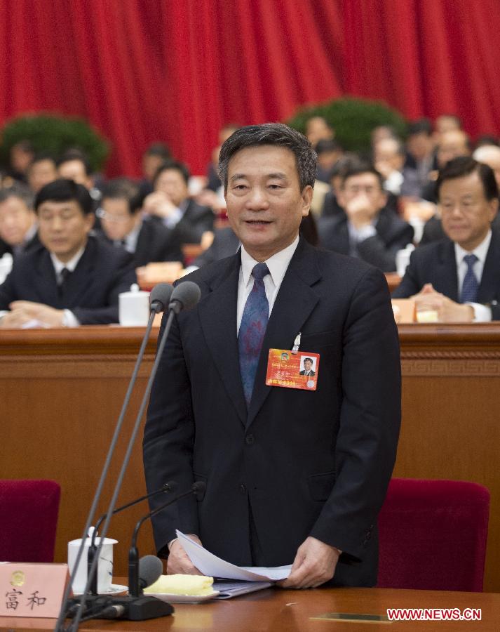 Luo Fuhe presides over the third plenary meeting of the first session of the 12th National Committee of the Chinese People's Political Consultative Conference (CPPCC) at the Great Hall of the People in Beijing, capital of China, March 8, 2013. (Xinhua/Li Xuren)