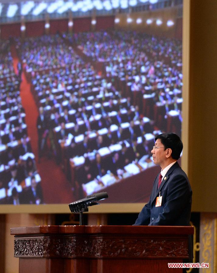Cao Jianming, China's procurator-general of the Supreme People's Procuratorate (SPP), delivers a report on the SPP's work during the third plenary meeting of the first session of the 12th National People's Congress (NPC) at the Great Hall of the People in Beijing, capital of China, March 10, 2013. (Xinhua/Li Tao)