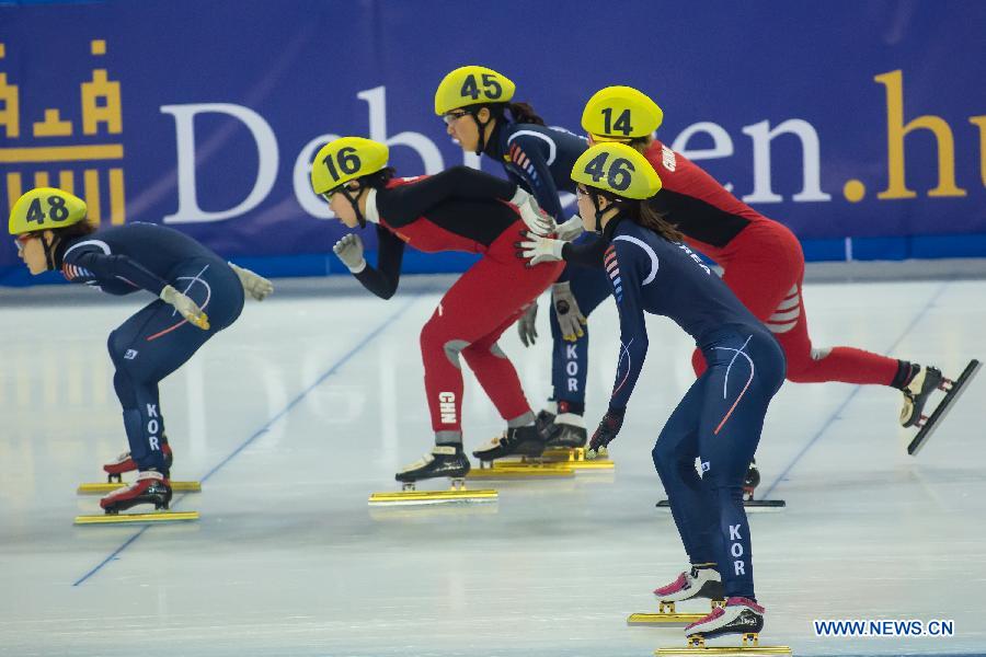 The China team and South Korea team compete during the women's 3000m Relay competition at the ISU World Short Track Speed Skating Championships in Debrecen, Hungary, on March 10, 2013. China won the gold medal with 4 minutes and 14.104 seconds. (Xinhua/Attila Volgyi) 