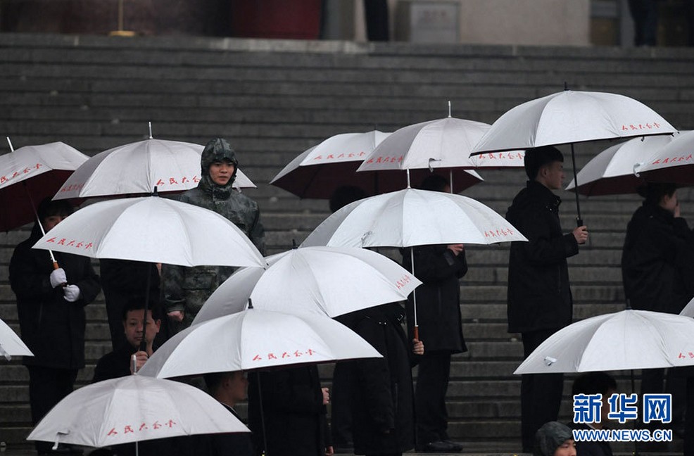 An expected spring rain adds glamour to the scenery of the Great Hall of the People in Beijing. The closing meeting of the first session of the 12th National Committee of the Chinese People's Political Consultative Conference (CPPCC) was held at the Great Hall of the People in Beijing, capital of China, March 12, 2013. (Xinhua News Agency/Zhai Zihe)