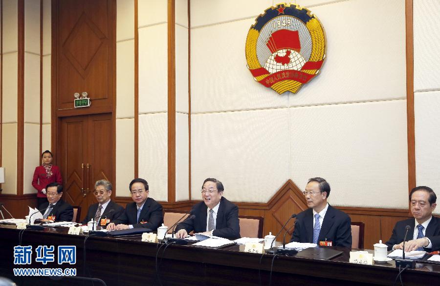 Yu Zhengsheng (3rd R), a member of the Standing Committee of the Political Bureau of the Communist Party of China (CPC) Central Committee, who is also chairman of the 12th National Committee of the Chinese People's Political Consultative Conference (CPPCC), presides over the first meeting of the chairman and vice-chairpersons of the 12th CPPCC National Committee in Beijing, capital of China, March 12, 2013. (Xinhua/Ju Peng)