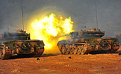 Armored regiment in live-ammunition drill