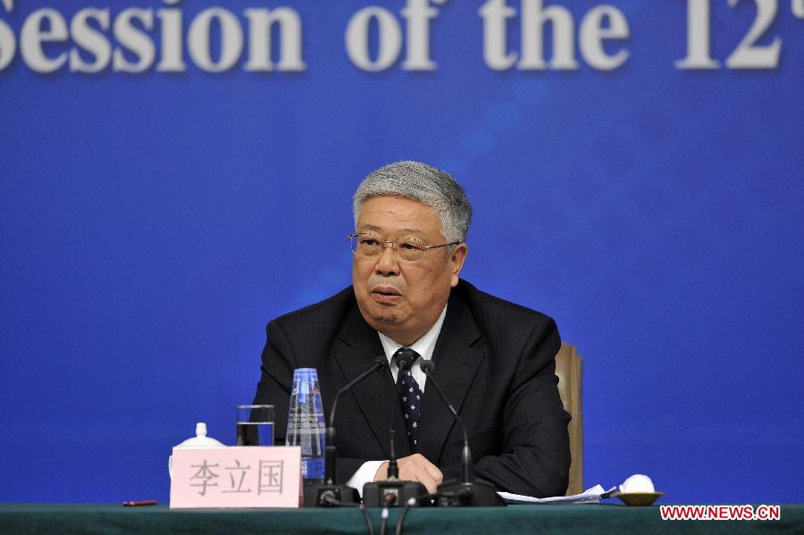 Minister of Civil Affairs Li Liguo attends a news conference on people's livelihood and social service held by the first session of the 12th National People's Congress (NPC) in Beijing, capital of China, March 13, 2013. (Xinhua/Wang Peng)