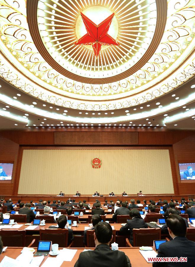 The presidium of the first session of the 12th National People's Congress (NPC) hold their fourth meeting at the Great Hall of the People in Beijing, capital of China, March 13, 2013. (Xinhua/Ma Zhancheng) 