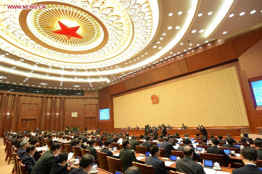 The presidium of the first session of the 12th National People's Congress (NPC) hold their eighth meeting at the Great Hall of the People in Beijing, capital of China, March 16, 2013. Zhang Dejiang, executive chairperson of the presidium, presided over the meeting on Saturday. (Xinhua/Ma Zhancheng)  