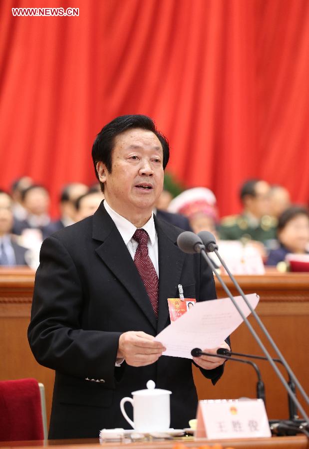 Wang Shengjun presides over the sixth plenary meeting of the first session of the 12th National People's Congress (NPC) at the Great Hall of the People in Beijing, capital of China, March 16, 2013. (Xinhua/Lan Hongguang)