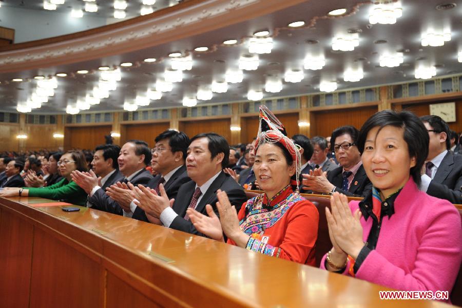 Deputies applaud during the sixth plenary meeting of the first session of the 12th National People's Congress (NPC) at the Great Hall of the People in Beijing, capital of China, March 16, 2013. (Xinhua/Xie Huanchi)