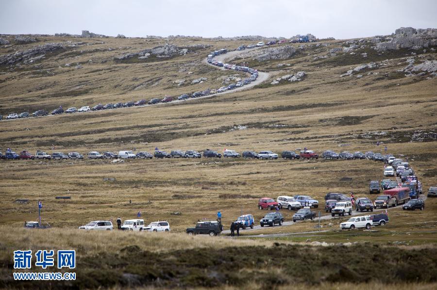 Local residents participate in a vehicle parade in Falklands (Malvinas) Islands, March 11, 2013. The referendum on whether the Malvinas, known to the Britons as the Falklands Islands, would retain their political status as "British Overseas Territory" started at 10 a.m. local time on Sunday morning (1300 GMT). (Xinhua/Martin Zabala)
