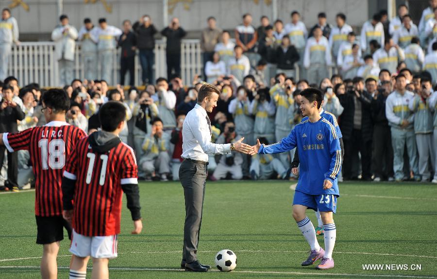 Beckham in Beijing, playing football in suits (5)