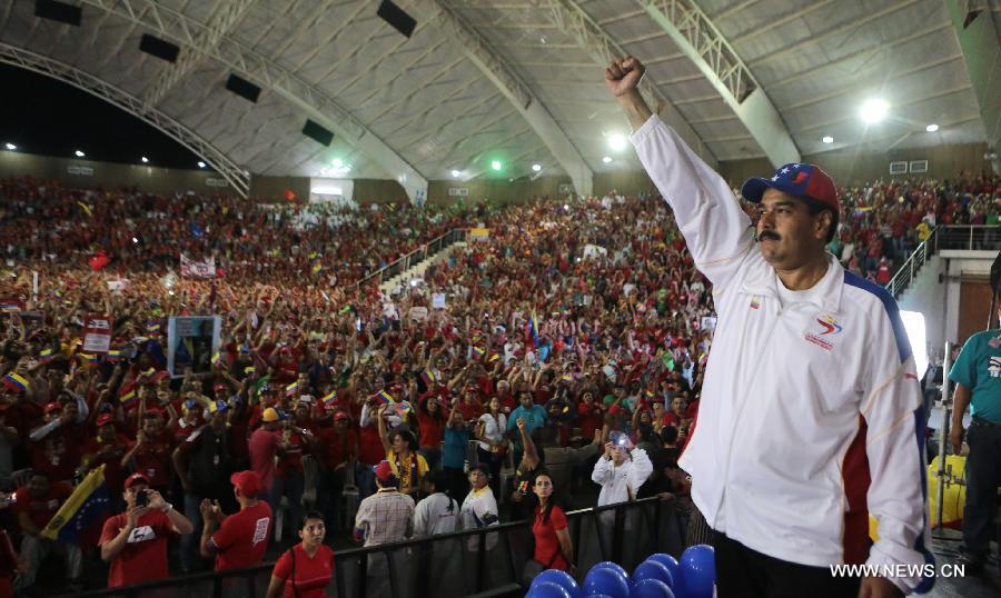 Image provided by Command Campaign Hugo Chavez shows Venezuela's Acting President Nicolas Maduro attending a rally in Lara State, Venezuela, on March 24, 2013. (Xinhua/Command Campaign Hugo Chavez)