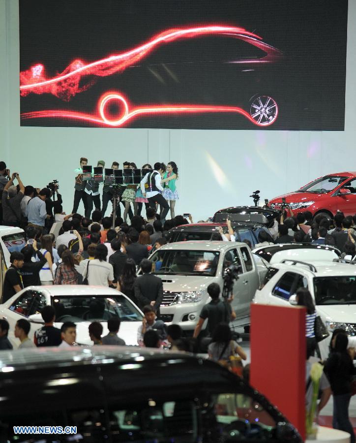 People visit the press preview of the 34th Bangkok International Motor Show in Bangkok, Thailand, on March 26, 2013. The 34th Bangkok International Motor Show will be held from March 27 to April 7. (Xinhua/Gao Jianjun) 