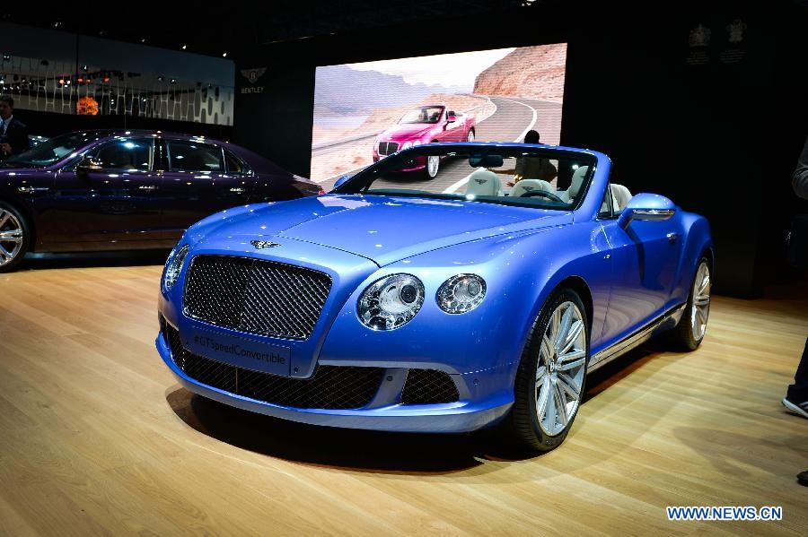 A Bentley GT Speed Convertible is on display during press preview of the 2013 New York International Auto Show in New York, on March 27, 2013. The show features about 1,000 vehicles and will open to the public from March 29 to April 7. (Xinhua/Niu Xiaolei)  