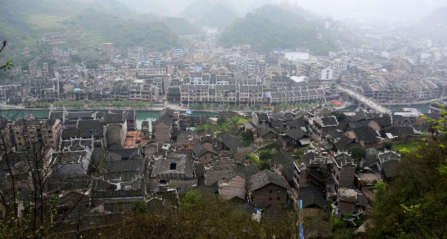 This bird eye view shows the Zhenyuan County in southwest China's Guizhou Province, March 31, 2013. The county could date back 2,280 years with the Wuyang River running through it. As many ancient style architectures were built along the river, the ancient town was dubbed as "Oriental Venice" by tourists. (Xinhua/Hu Yan) 