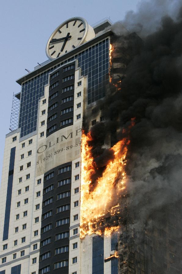 A fire rages in a 40-story skyscraper in Grozny, the capital of Russia's Chechnya, April 3, 2013. (Xinhua/RIA Novosti)
