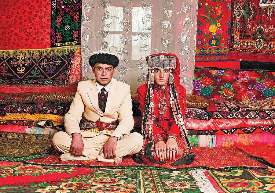 Newly Weds, October 2009. Tashi Kuergan Tajik autonomous county in the Xinjiang Uygur autonomous region has a long history as a stop on the ancient Silk Road. But not any more. Award-winning Chinese photographer Li Xinzhao captures the beauty of the forgotten ancient town and its people. (Photo/China Daily)