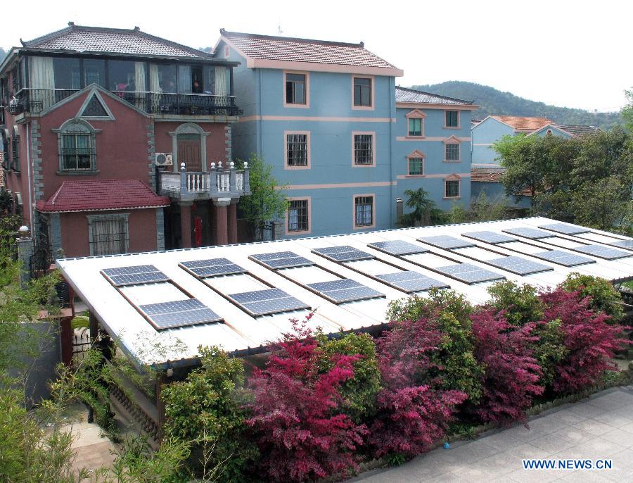 Photo taken on April 8, 2013 shows a homemade photovoltaic power station made by a local resident named Mo Zhikai in Wumeng Village of Ningbo City, east China's Zhejiang Province.  (Xinhua/Gong Guorong)