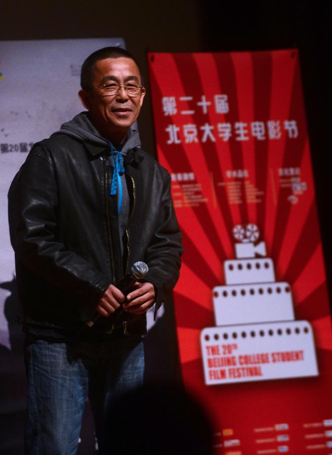 Lv Le, director of micro film "One Dimension", attends the opening ceremony of the 20th Beijing College Student Film Festival in Beijing, capital of China, April 11, 2013. The Taiwanese movie "Touch of the Light" opened the one-month festival on Thursday at Haidian Theatre. (Xinhua/Jin Liangkuai)
