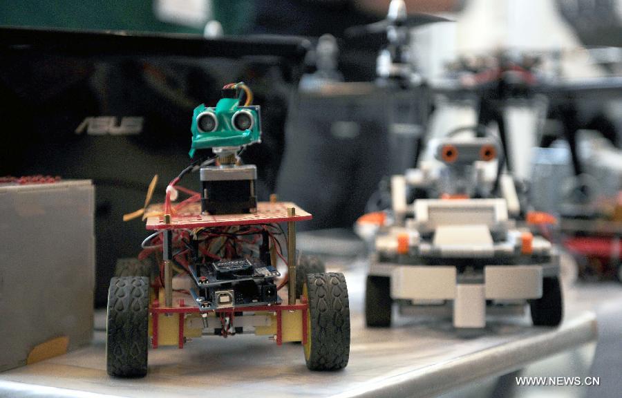 Robots is displayed in Istanbul, Turkey, April 11, 2013. The three-day Istanbul Technical University Robot Olympics was held in Demirel cultural center of Istanbul Technical University on Thursday. More than 100 teams from universities and high schools in Turkey participated in competitions and other activities. (Xinhua/Lu Zhe) 
