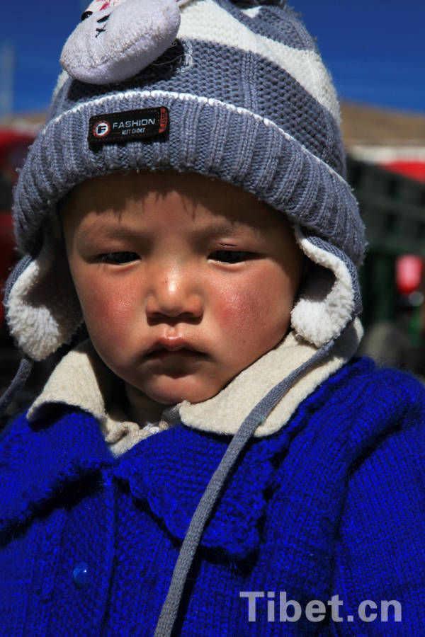 A Tibetan kid in Lhoka Prefecture, southern Tibet. Lhoka, a glorious place with remarkable people, is the cradle of Tibetan civilization. [Photo/China Tibet Online]