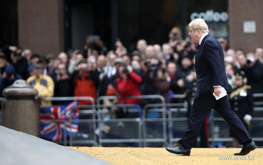 Boris Johnson, mayor of London, arrives for the funeral of former British Prime Minister Margaret Thatcher, outside St. Paul's Cathedral in London, Britain on April 17, 2013. The funeral of Margaret Thatcher, the first female British prime minister, started 11 a.m. local time on Wednesday in London. (Xinhua/Wang Lili)