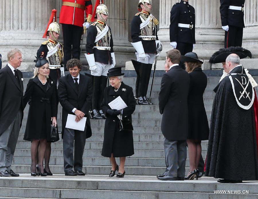 Queen Elizabeth II leaves St. Paul's Cathedral following the ceremonial funeral service of former British Prime Minister Margaret Thatcher in London, Britain, April 17, 2013. The funeral of Margaret Thatcher, the first female British prime minister, started 11 a.m. local time on Wednesday in London. (Xinhua/Yin Gang)