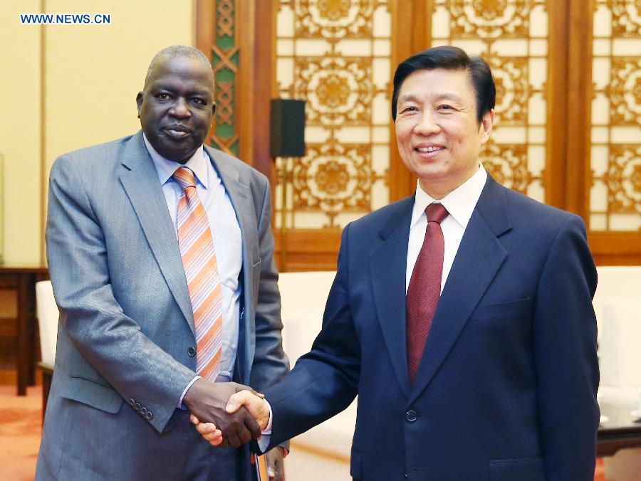 Chinese Vice President Li Yuanchao (R) meets with Kom Kom Geng, head of a delegation from the Sudan People's Liberation Movement (SPLM) of South Sudan, in Beijing, capital of China, April 18, 2013. (Xinhua/Yao Dawei)