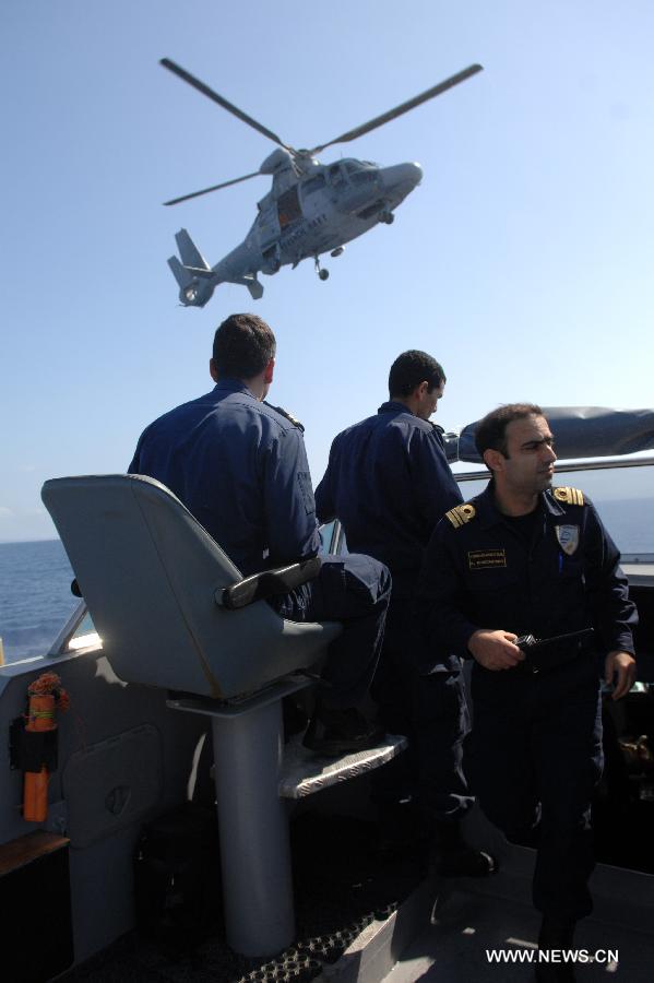 Search and rescue military exercise among air and naval forces of Cyprus and France is held at the southern part of Larnaca, Cyprus, April 16, 2013. France participated with the anti-air frigate of the French Marine Nationale, Jean Bart (D615), while Cyprus with Helicopters and smaller ships. At the scenario, forces had to face a "Nautical Incident" at exclusive economic zone (EEZ) controlled by Cyprus. (Xinhua/Stefanos Kouratzis) 