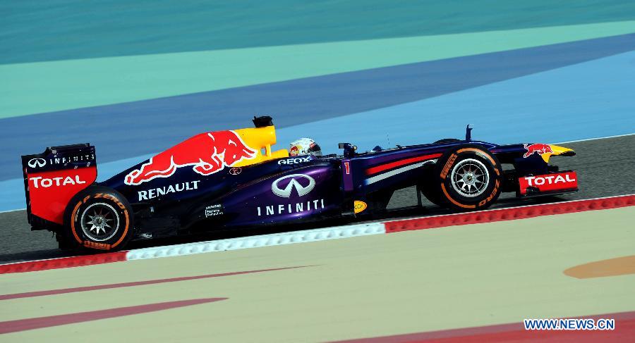 Red Bull driver Sebastian Vettel drives during the Bahrain F1 Grand Prix at the Bahrain International Circuit in Manama, Bahrain, on April 21, 2013. (Xinhua/Chen Shaojin)