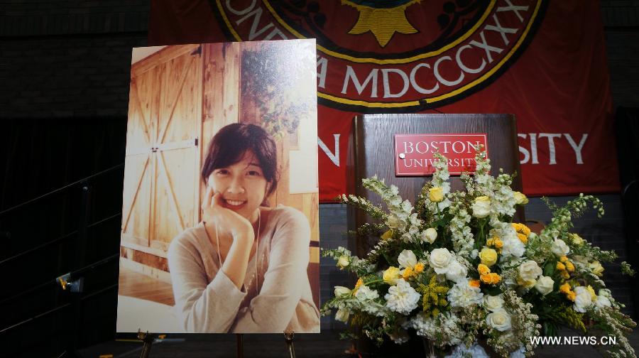 Boston bombing victim Lu Lingzi's photo is seen during her memorial service at Boston University in Boston, the United States, on April 22, 2013. Lu Lingzi, a Boston University student from China, was killed in the deadly Boston Marathon explosions on April 15. (Xinhua/Han Youjia)