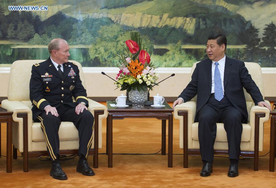 Chinese President Xi Jinping (R), who is also chairman of the Central Military Commission, meets with Martin Dempsey, chairman of the U.S. Joint Chiefs of Staff, in Beijing, capital of China, April 23, 2013. (Xinhua/Xie Huanchi)