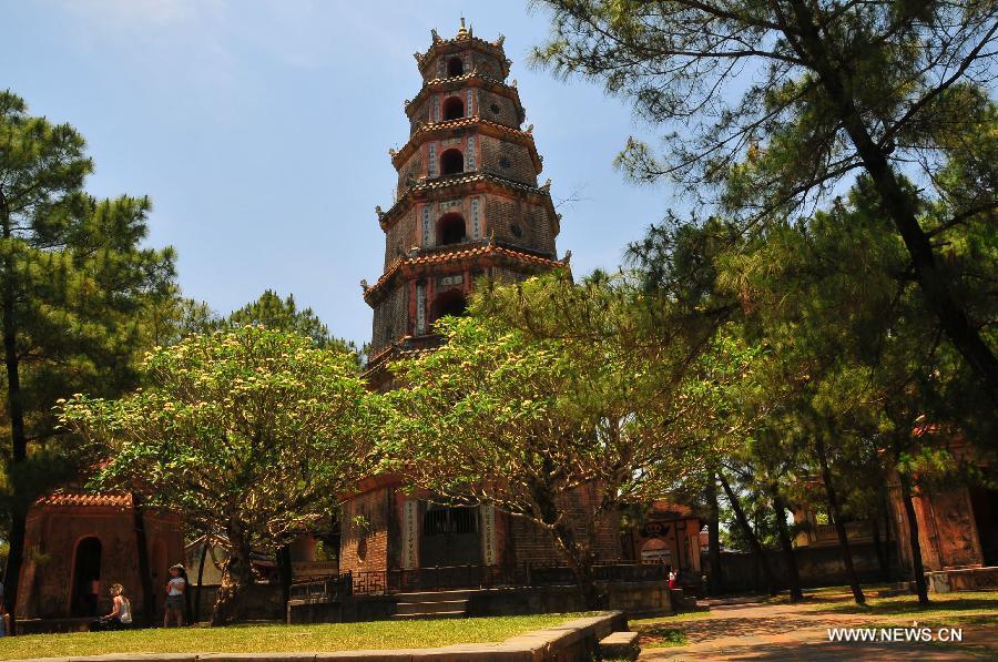 Photo taken on April 28, 2013 shows the tower in Hue, a famous historic and cultural city in central Vietnam. Hue was the capital of Nguyen Dynasty, the country's last feudal dynasty. Hue was recognized by the United Nations Educational, Scientific and Cultural Organization as a World Heritage in 1993. (Xinhua/Zhang Jianhua) 